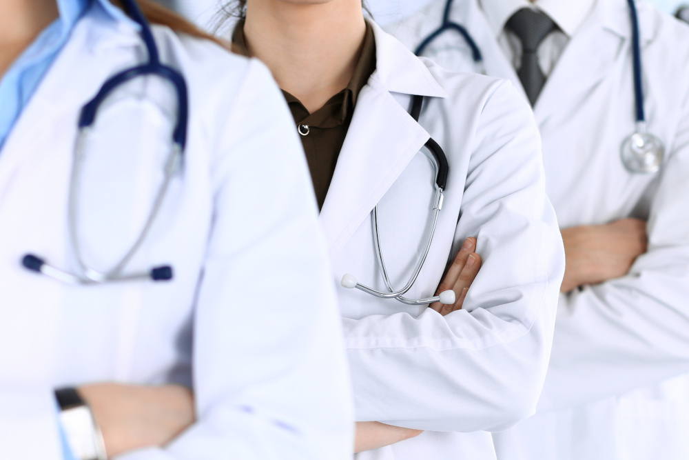 Group of modern doctors standing