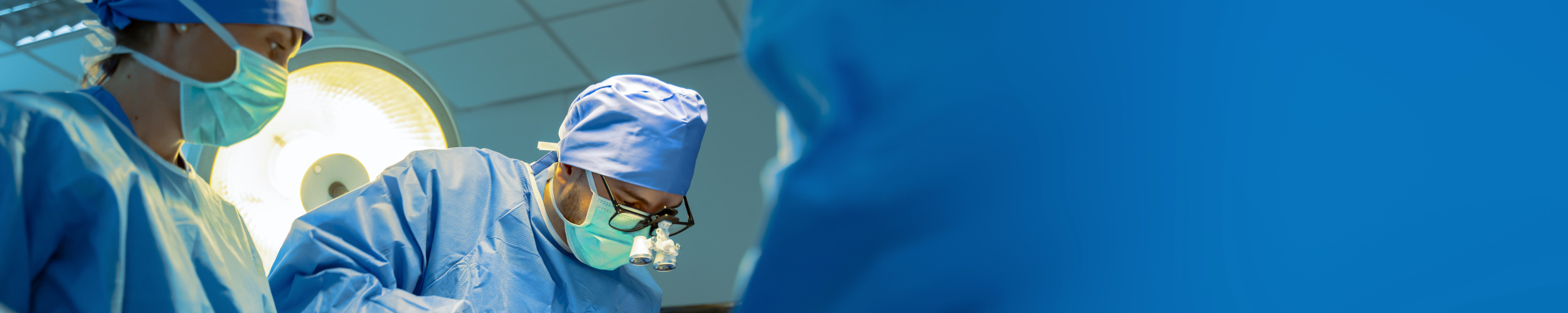 Group of surgeons doing