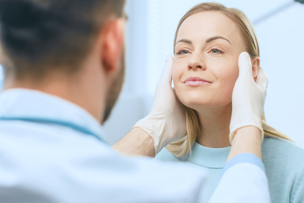 doctor examining patient