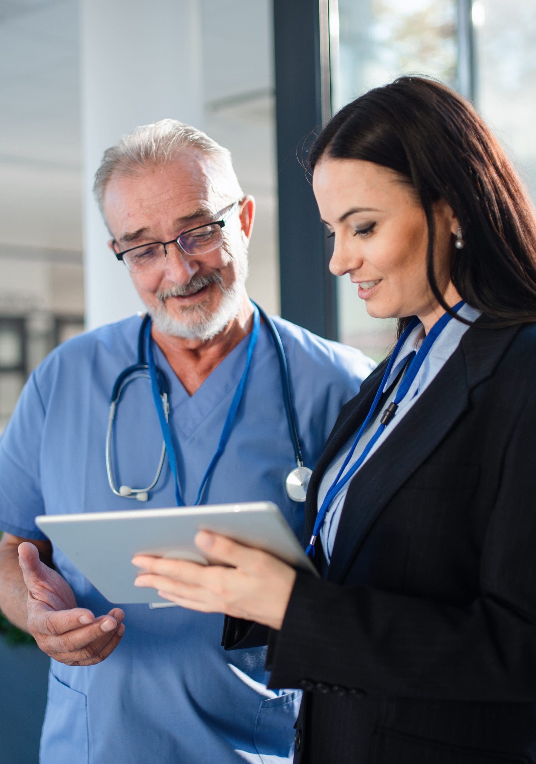 doctor viewing tablet