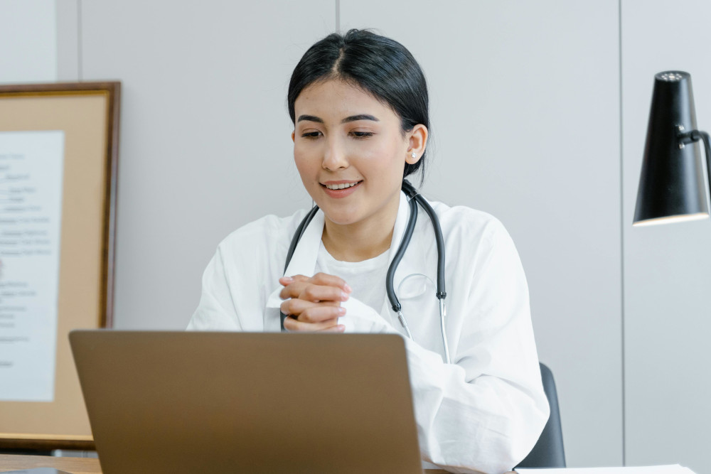 young doctor on laptop